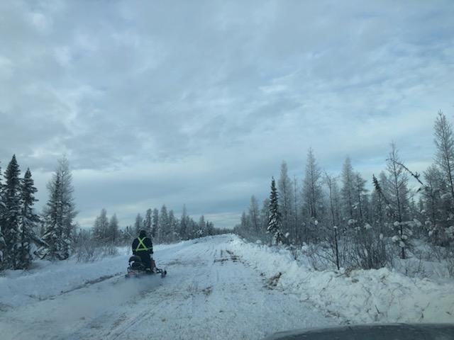 Snowmobile riding through the snow